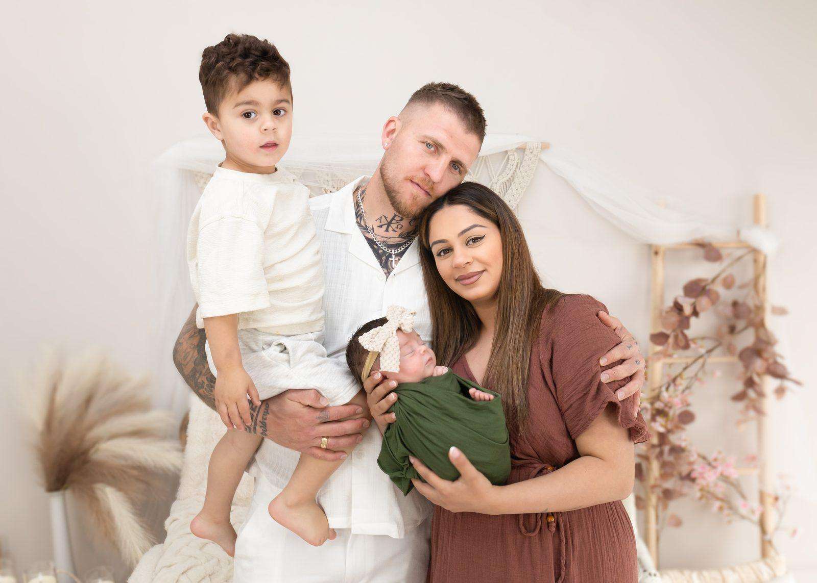 Family of four in studio
